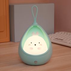 Lampa de veghe portabila cu 2 moduri de functionare Flippy, silicon non-toxic, reincarcabila USB, senzor miscare, albastru, iepu